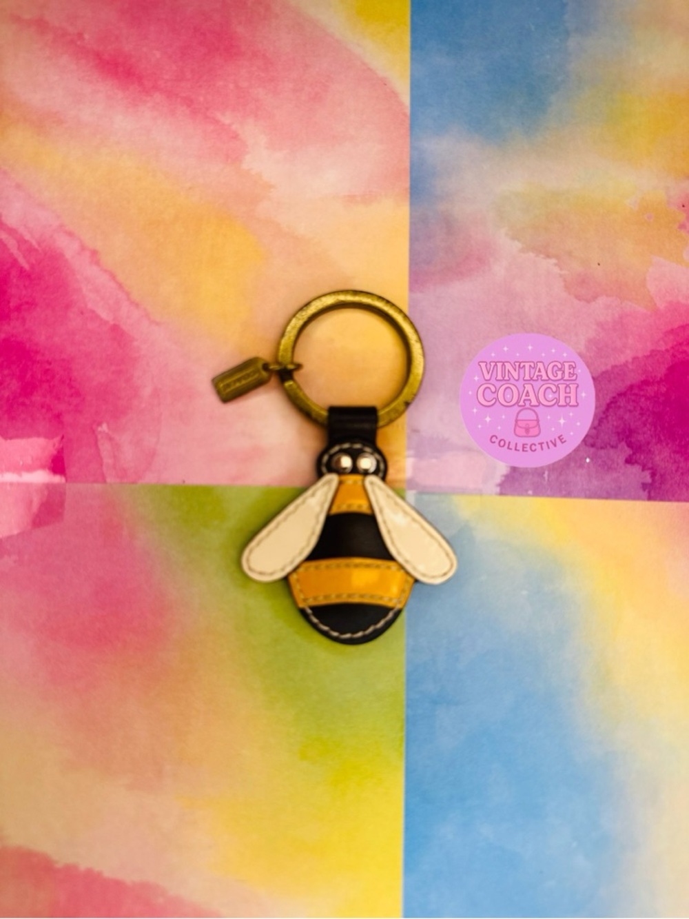 Coach bee charm